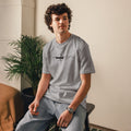 person wearing heather grey cotton t-shirt