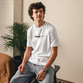 person wearing white cotton t-shirt