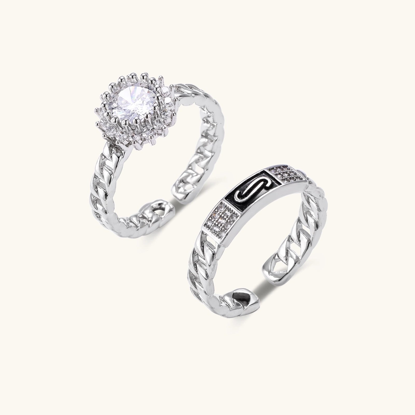 Two adjustable white gold plated rings with chain-link bands, featuring cubic zirconia halo and enamel details