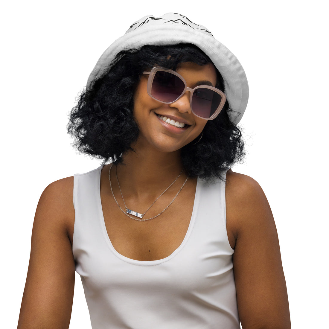 woman wearing reversible bucket hat
