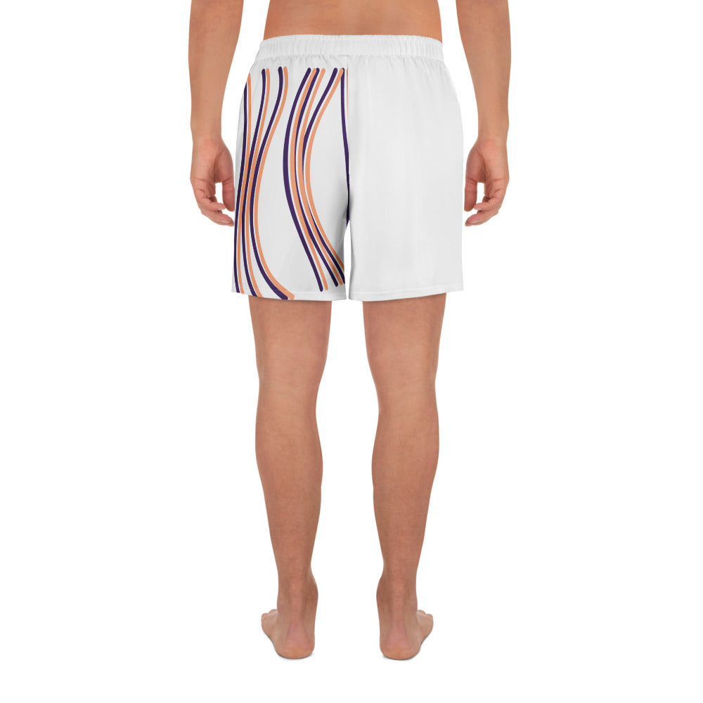 back view of person wearing long athletic shorts