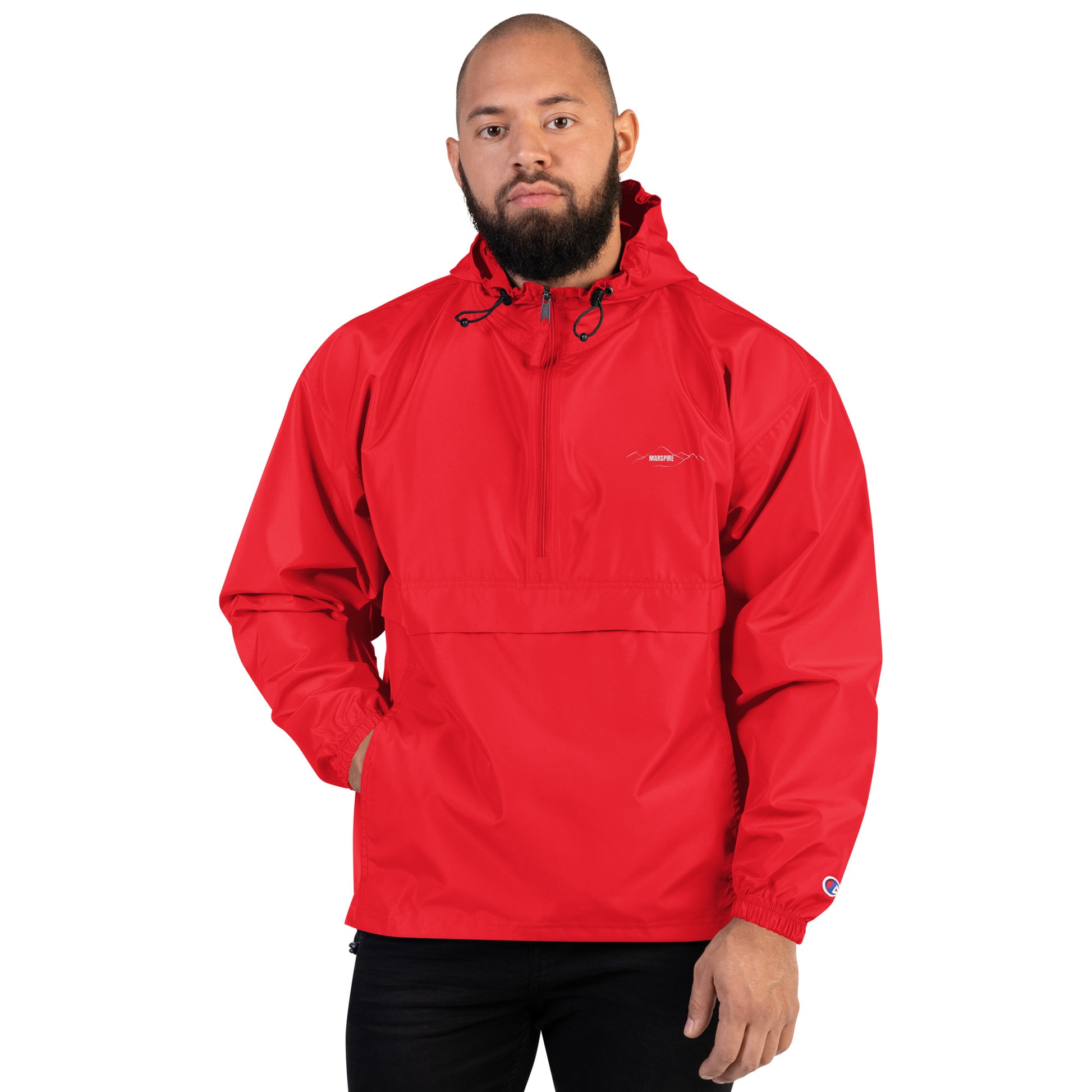 person wearing scarlet champion packable jacket