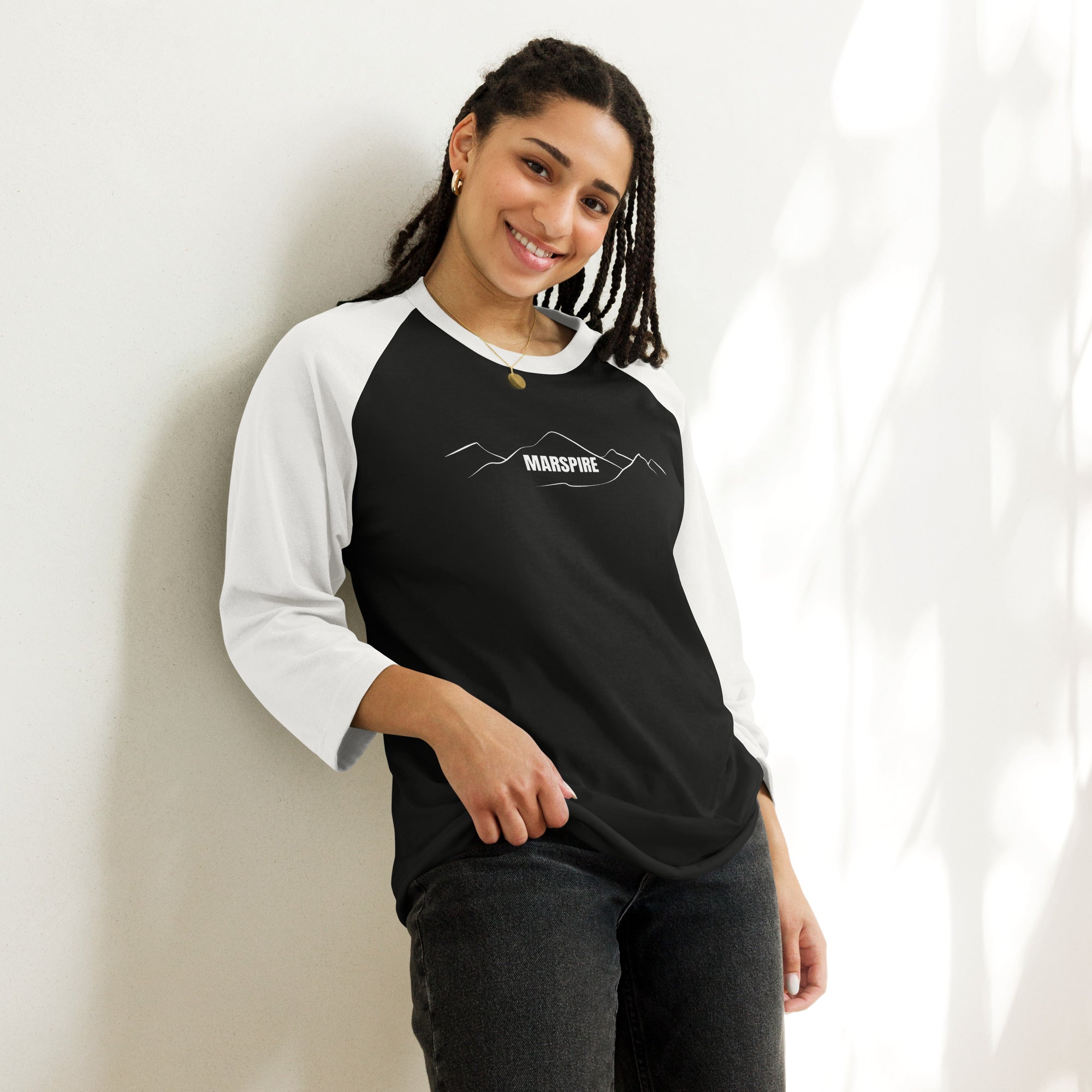 person wearing black & white raglan tee shirts